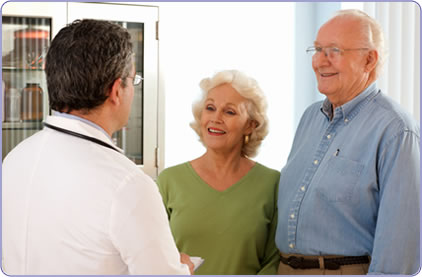 Pharmacist with elderly couple